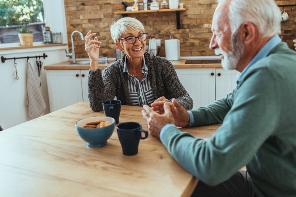 seniors sitting at kitchen table