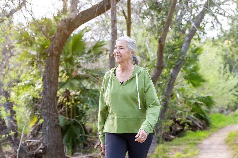 woman walking down path